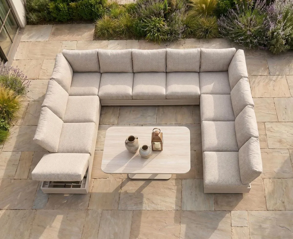 Luxury outdoor sectional sofa on a spacious villa patio 3
