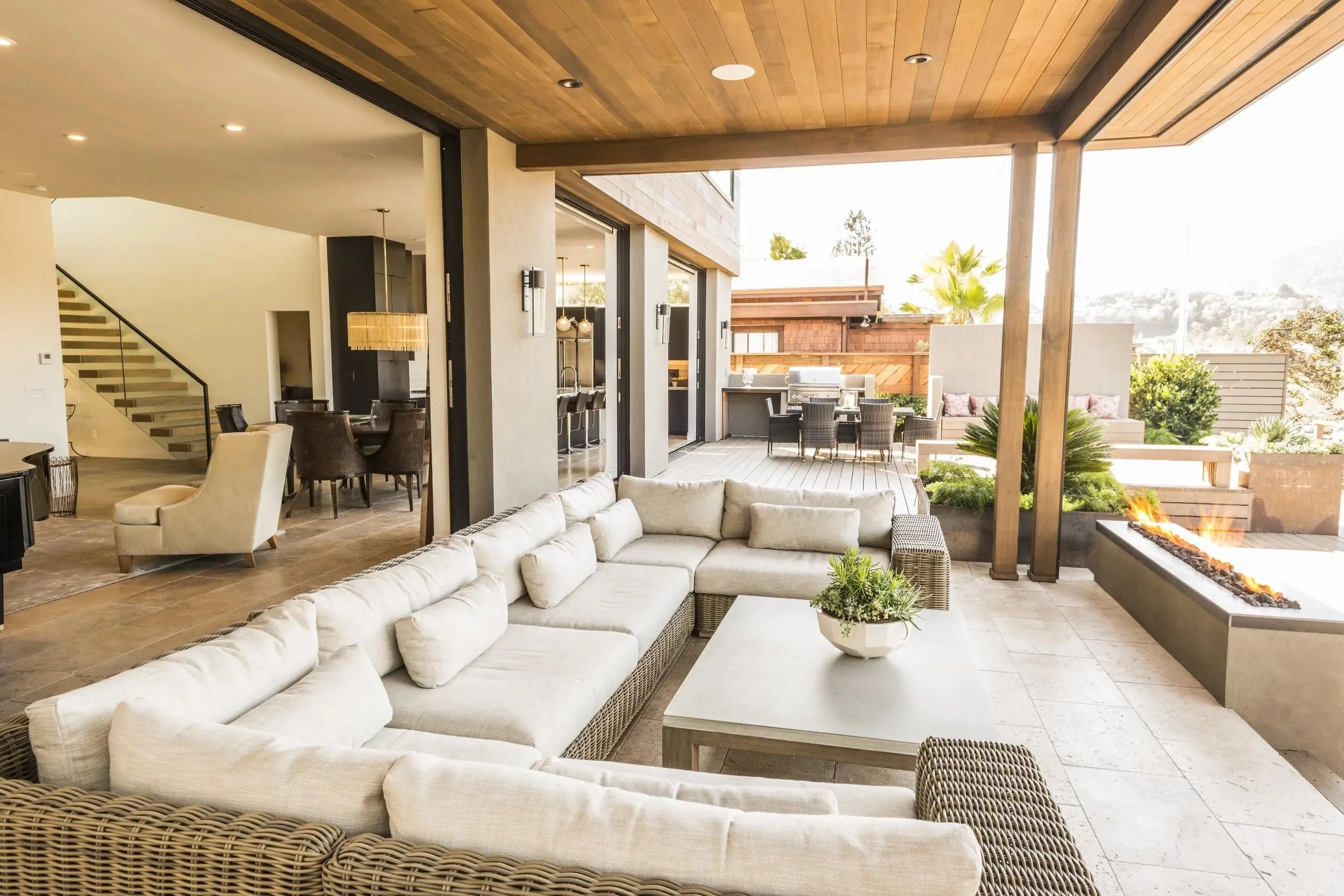 Luxury outdoor sectional sofa on a spacious villa patio 2